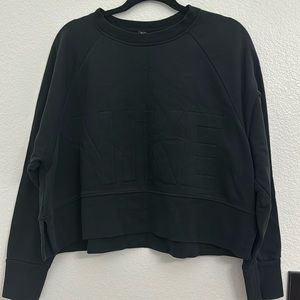 Black Nike cropped sweater
